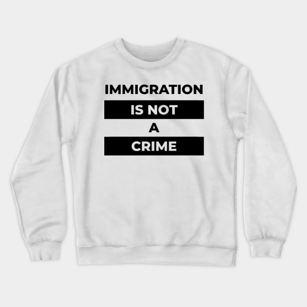 Immigration Is Not A Crime (Black Print) Crewneck Sweatshirt by the gulayfather